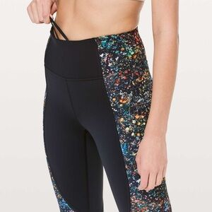 Lululemon Wake and Train Tight in the Black/Flowerescent Multi color.